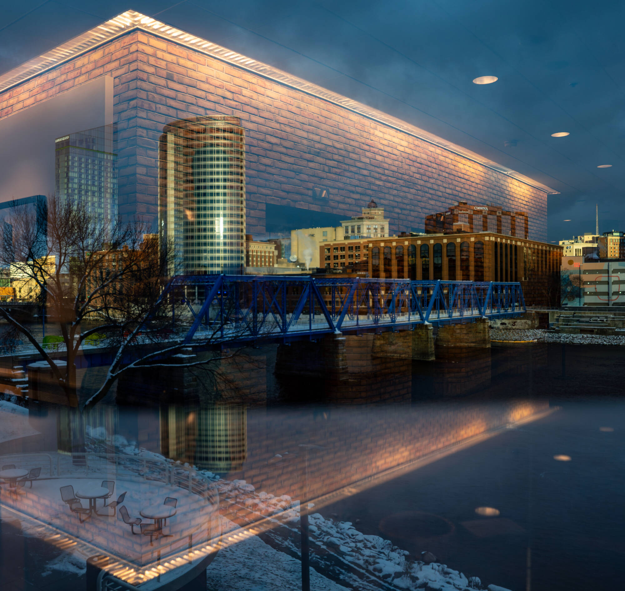 Downtown Grand Rapids is pictured through a reflective window at the Eberhard Center on the Pew Campus on December 2.